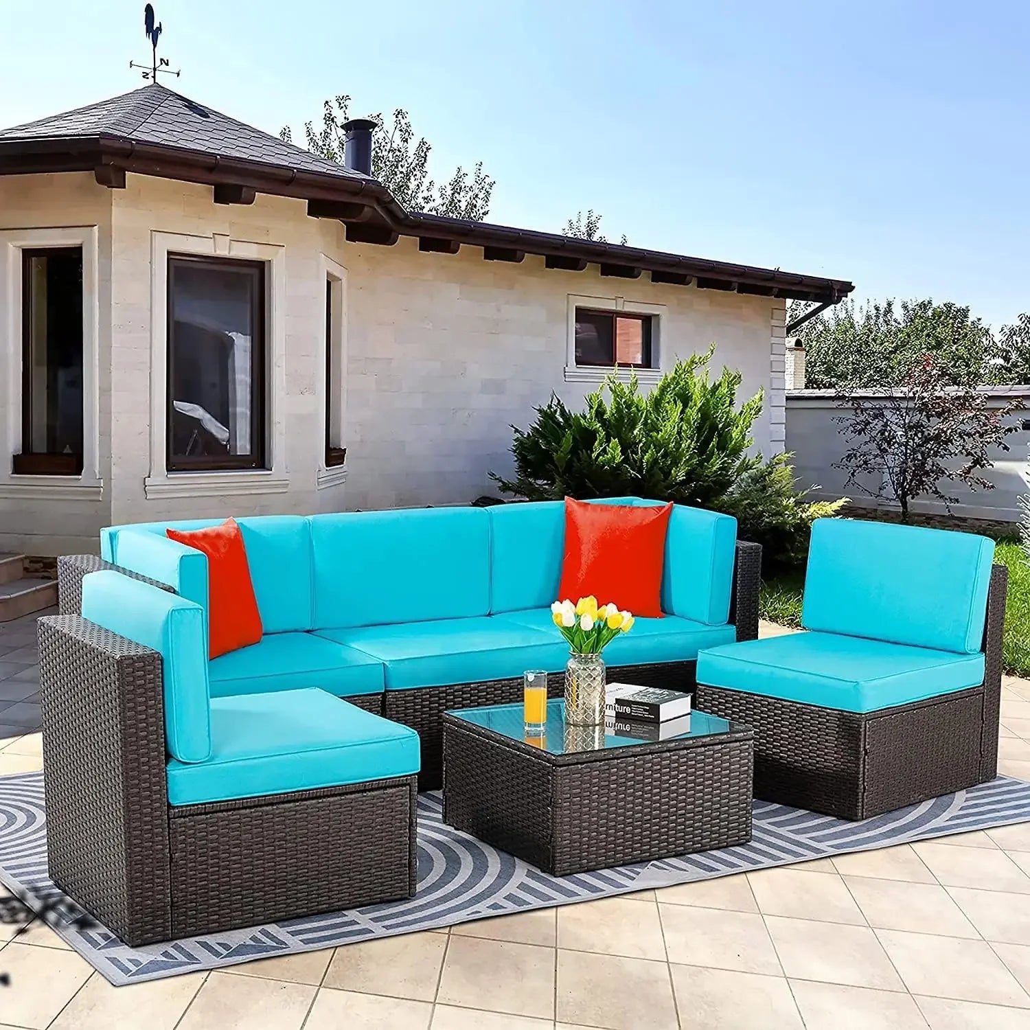 wicker outdoor sectional furniture with glass table and cushions